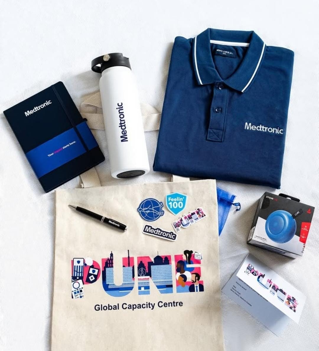 An employee receiving a welcome kit box